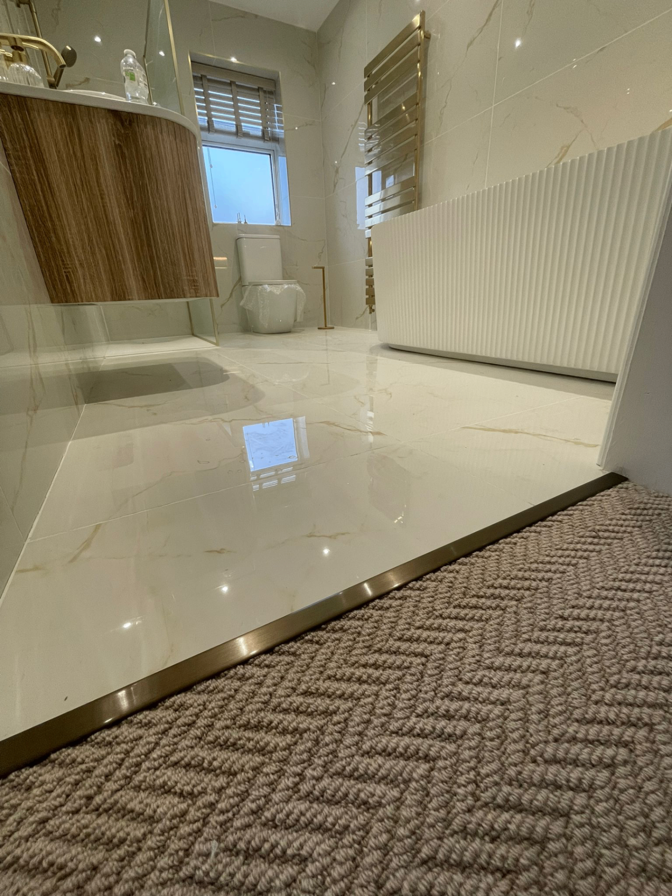 Marble bathroom to carpet threshold