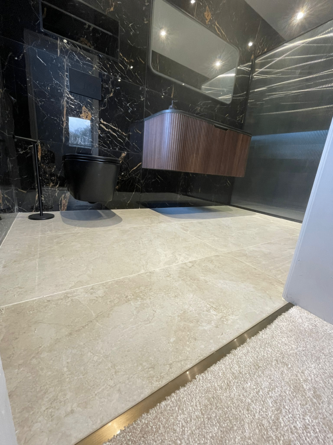 Black marble bathroom floor